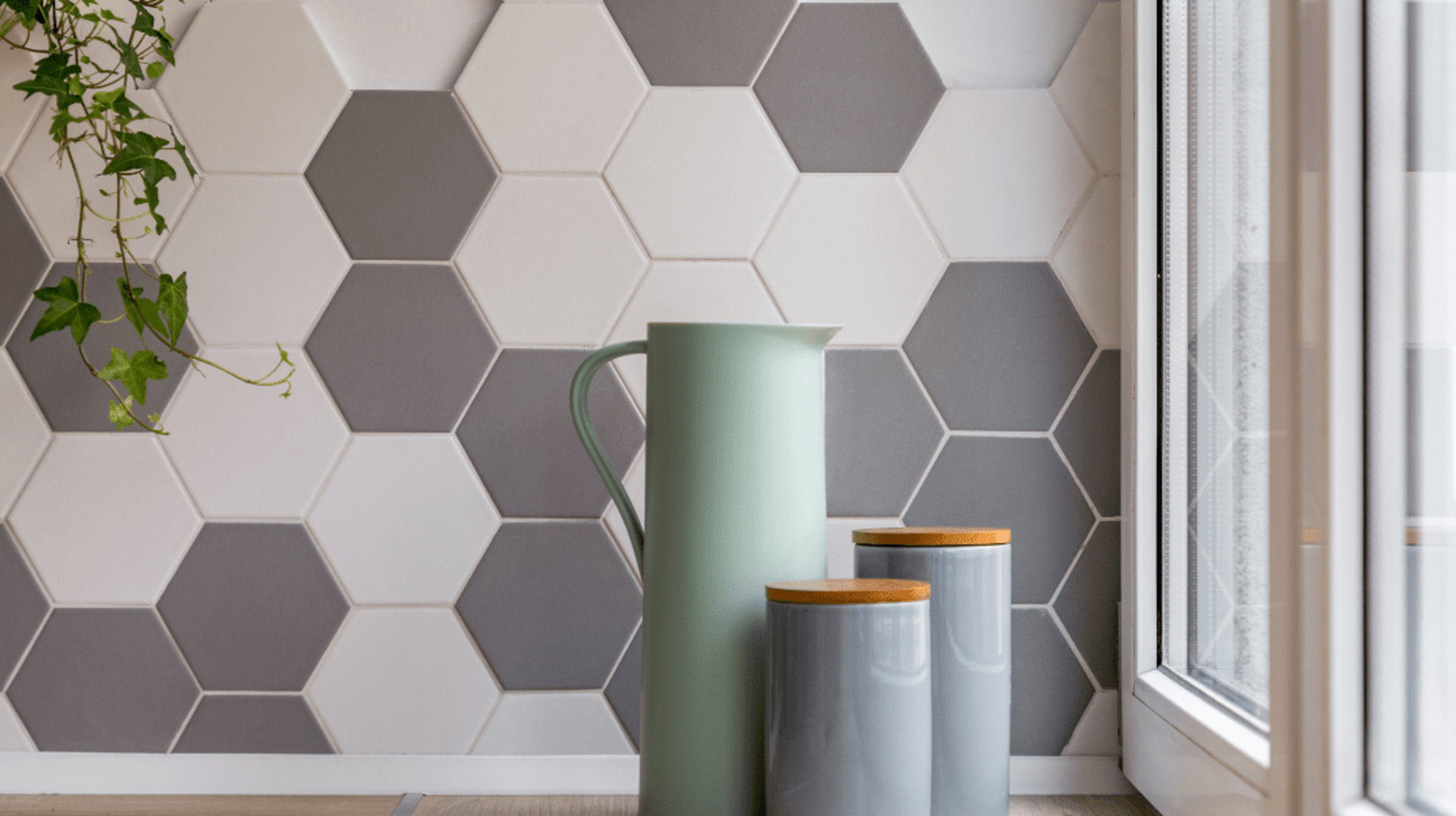 Modern hexagon wall tiles in grey and white creating geometric pattern